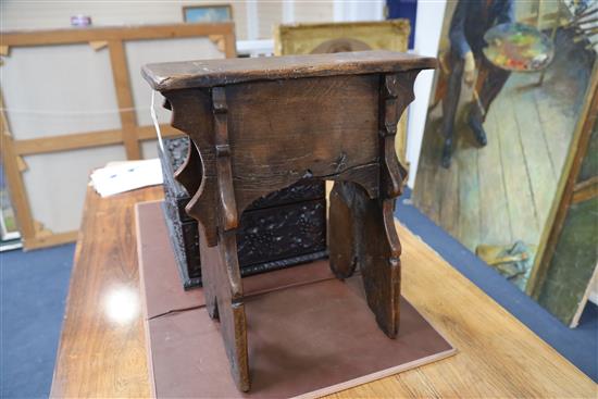 An early 17th century boarded oak stool, 1ft 7.5in. x 8.5in. H.1ft 10.5in.